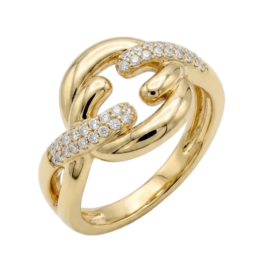Gold ring with diamond accents on a white background